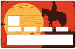 Cowboy au soleil couchant- sticker pour carte bancaire, 2 formats de carte bancaire disponibles